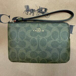 coach Corner Zip Wristlet In Signature Canvas caq75